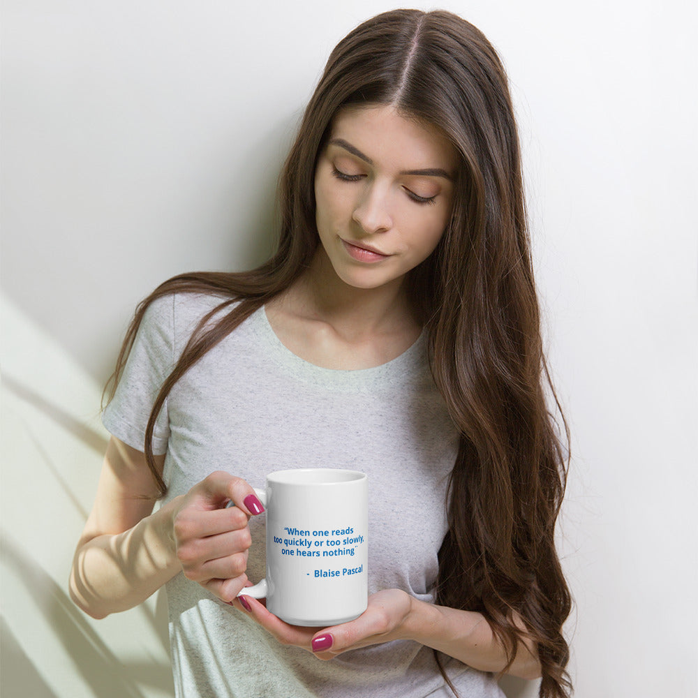 “When one reads too quickly or too slowly, one hears nothing " - Blaise Pascal - White glossy mug